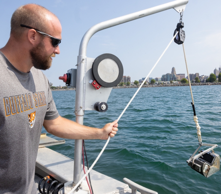 Brian Haas operating equipment on the water