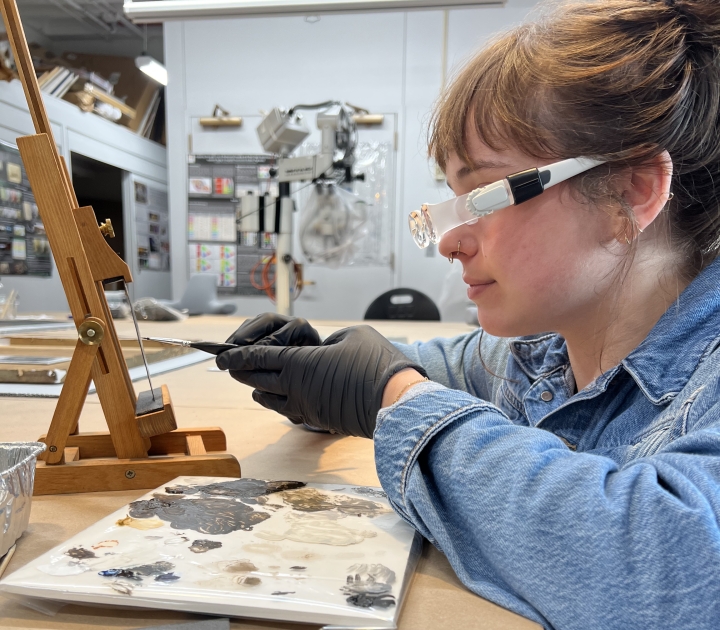 Rebecca Heyman working in conservation lab