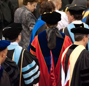 Faculty wearing regalia at Commencement ceremony