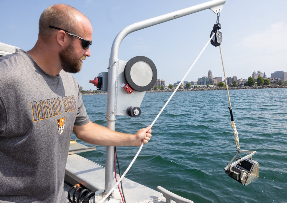 Brian Haas operating equipment on the water